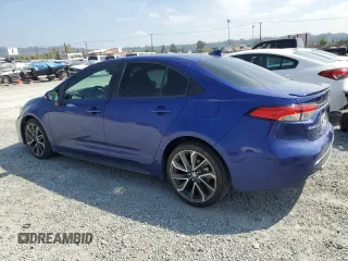 2022 Toyota Corolla SE with VIN 5YFS4MCE8NP106186, listed as a Copart auction lot 50429145 with 54,889 mi miles and Salvage Title. Bid and sale history available at carsss.com. Image 2.