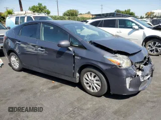 2014 Toyota Prius with VIN JTDKN3DP9E3052770, listed as a Copart auction lot 60000005 with 171,707 mi miles and Salvage title. Bid and sale history available at DreamBid. Image 4.