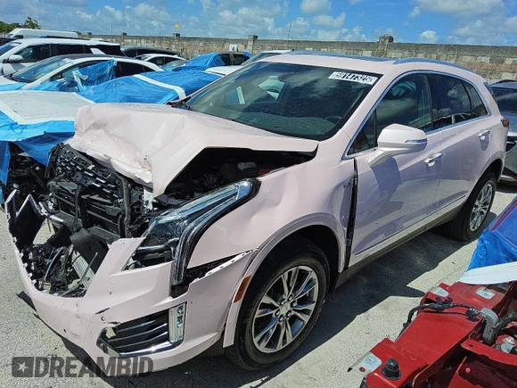 2023 Cadillac XT5 FWD Premium Luxury z VIN 1GYKNCR45PZ160005, wystawiony jako Copart lot #59147325 z przebiegiem 70 322 mil mil oraz Szkoda całkowita • Salvage title. Historia ofert i sprzedaży dostępna na DreamBid. Obrazek 1.