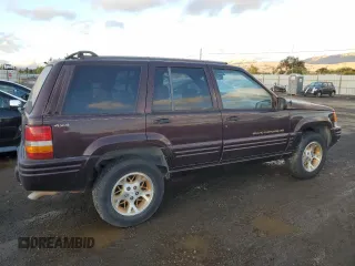 1996 Jeep Grand Cherokee Limited with VIN 1J4GZ78Y3TC182569, listed as a Copart auction lot 80314334 with 302,994 mi miles and Clean Title. Bid and sale history available at carsss.com. Image 3.
