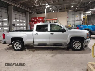 2014 Chevrolet Silverado 1500 LT with VIN 3GCUKREC7EG194659, listed as a IAAI auction lot 41547275 with 161,046 mi miles and . Bid and sale history available at DreamBid. Image 13.
