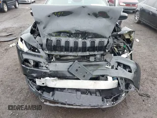 2016 Jeep Cherokee Sport z VIN 1C4PJMAB4GW340102, wystawiony jako IAAI lot #42527824 z przebiegiem 158 879 mil mil oraz . Historia ofert i sprzedaży dostępna na DreamBid. Obrazek 6.