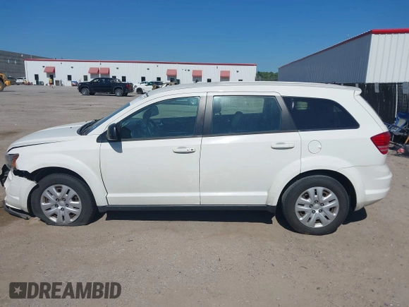 2014 Dodge Journey SE with VIN 3C4PDCAB2ET258681, listed as a IAAI auction lot 42558132 with 136,569 mi miles and . Bid and sale history available at DreamBid. Image 14.