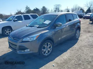 2013 Ford Escape SEL with VIN 1FMCU9H93DUA72572, listed as a IAAI auction lot 41633096 with 190,816 mi miles. Bid and sale history available at carsss.com. Image 2.