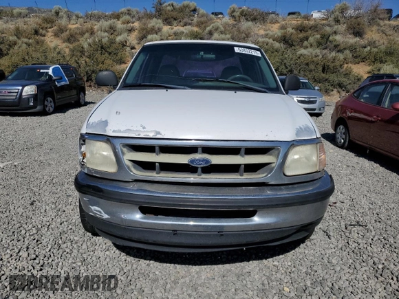 1998 Ford F-150 with VIN 1FTZX1720WKA20813, listed as a Copart auction lot 63852215 with 215,729 mi miles and Salvage title. Bid and sale history available at DreamBid. Image 5.