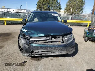 2019 Volkswagen Tiguan SE with VIN 3VV2B7AX9KM099426, listed as a Copart auction lot 48797565 with 74,009 mi miles and Salvage Title. Bid and sale history available at DreamBid. Image 5.