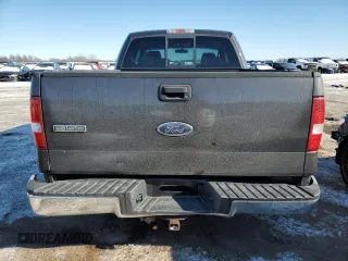 2005 Ford F-150 XLT with VIN 1FTPX12555FB05467, listed as a Copart auction lot 45712335 with 401,186 mi miles and Salvage Title. Bid and sale history available at carsss.com. Image 6.