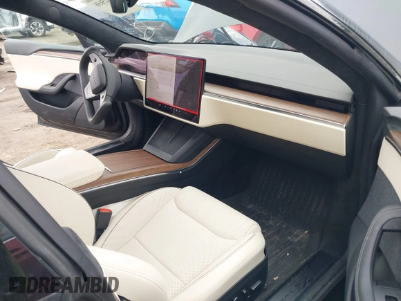 2021 Tesla Model S Plaid with VIN 5YJSA1E69MF439147, listed as a IAAI auction lot 41825656 with 25,626 mi miles. Bid and sale history available at carsss.com. Image 5.