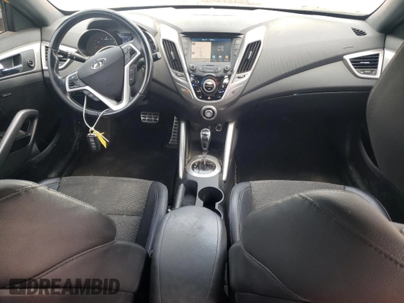 2016 Hyundai Veloster z VIN KMHTC6AD8GU278670, wystawiony jako Copart lot #57315695 z przebiegiem 89 496 mil mil oraz Szkoda całkowita • Salvage title. Historia ofert i sprzedaży dostępna na DreamBid. Obrazek 8.