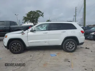2014 Jeep Grand Cherokee Limited with VIN 1C4RJEBG1EC403972, listed as a IAAI auction lot 41455012 with 241,168 mi miles and . Bid and sale history available at DreamBid. Image 14.