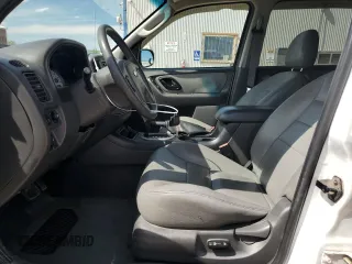 2005 Ford Escape XLT with VIN 1FMYU93145KA28777, listed as a Copart auction lot 58013995 with 94,308 mi miles and Clean title. Bid and sale history available at DreamBid. Image 7.