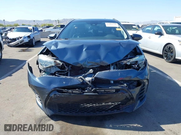 2019 Toyota Corolla L with VIN 2T1BURHE3KC207010, listed as a IAAI auction lot 42004596 with 106,188 mi miles and . Bid and sale history available at DreamBid. Image 6.