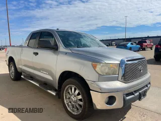 2012 Toyota Tundra z VIN 5TFRM5F10CX040423, wystawiony jako Copart lot #63373535 z przebiegiem 258 090 mil mil oraz Czysty tytuł • Clean title. Historia ofert i sprzedaży dostępna na DreamBid. Obrazek 1.