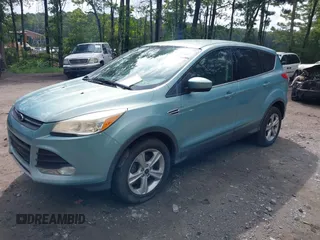 2013 Ford Escape SE z VIN 1FMCU0GX1DUD22225, wystawiony jako IAAI lot #42755402 z przebiegiem 180 784 mil mil oraz . Historia ofert i sprzedaży dostępna na DreamBid. Obrazek 2.