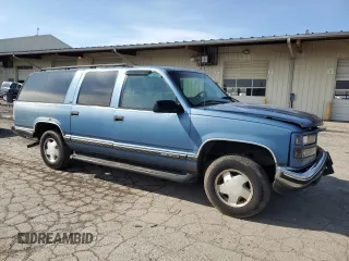 1997 GMC Suburban with VIN 1GKFK16R7VJ707618, listed as a Copart auction lot 49882035 with 317,771 mi miles and Salvage Title. Bid and sale history available at carsss.com. Image 4.