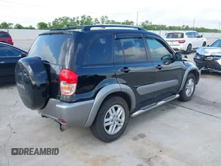 2001 Toyota RAV4 with VIN JTEGH20V910029962, listed as a IAAI auction lot 42092441 with 148,966 mi miles and . Bid and sale history available at DreamBid. Image 4.