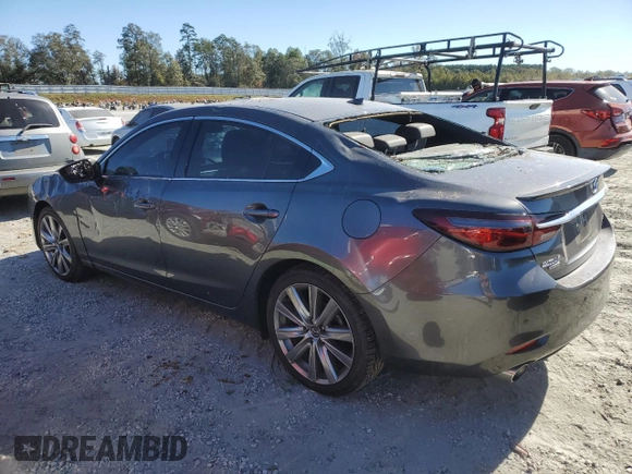2021 Mazda 6 Signature with VIN JM1GL1XY2M1619514, listed as a Copart auction lot 75494944 with 35,069 mi miles and Salvage Title. Bid and sale history available at DreamBid. Image 2.