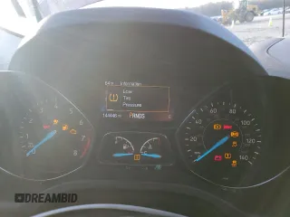 2017 Ford Escape S with VIN 1FMCU0F79HUE12519, listed as a Copart auction lot 86373094 with 144,446 mi miles and Salvage title. Bid and sale history available at DreamBid. Image 9.