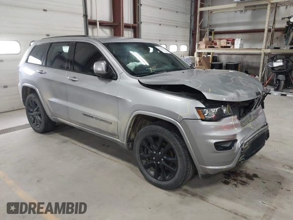 2018 Jeep Grand Cherokee Laredo E with VIN 1C4RJFAG6JC102969, listed as a IAAI auction lot 41963137 with 112,361 mi miles and . Bid and sale history available at DreamBid. Image 1.