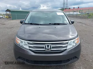 2012 Honda Odyssey EX-L with VIN 5FNRL5H68CB060487, listed as a IAAI auction lot 42176223 with 234,078 mi miles and . Bid and sale history available at DreamBid. Image 13.