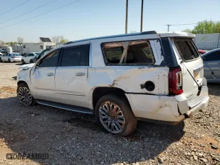 2016 GMC Yukon XL Denali with VIN 1GKS2HKJ7GR394839, listed as a Copart auction lot 52114765 with 122,308 mi miles and Salvage Title. Bid and sale history available at carsss.com. Image 2.