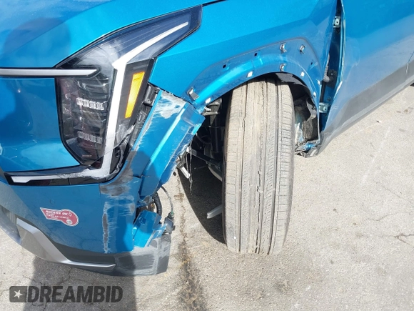 2024 Kia EV9 Wind z VIN KNDAFFS5XR6035878, wystawiony jako IAAI lot #41507204 z przebiegiem 3 364 mil mil oraz . Historia ofert i sprzedaży dostępna na DreamBid. Obrazek 6.