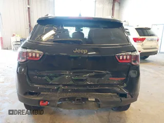 2022 Jeep Compass Trailhawk z VIN 3C4NJDDB7NT193831, wystawiony jako IAAI lot #42244555 z przebiegiem 81 632 mil mil oraz . Historia ofert i sprzedaży dostępna na DreamBid. Obrazek 16.