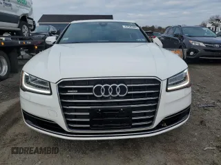 2015 Audi A8 z VIN WAUJGAFD9FN003570, wystawiony jako Copart lot #87642905 z przebiegiem 71 523 mil mil oraz Czysty tytuł • Clean title. Historia ofert i sprzedaży dostępna na DreamBid. Obrazek 5.