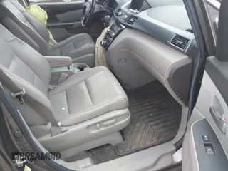 2012 Honda Odyssey Touring with VIN 5FNRL5H90CB045430, listed as a IAAI auction lot 42079770 with 113,901 mi miles and . Bid and sale history available at DreamBid. Image 5.