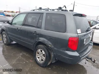 2005 Honda Pilot EX-L with NAVI with VIN 2HKYF18745H567671, listed as a IAAI auction lot 41577393 with 178,182 mi miles. Bid and sale history available at carsss.com. Image 3.