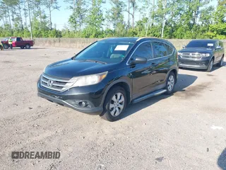2014 Honda CR-V LX with VIN 3CZRM3H37EG710537, listed as a IAAI auction lot 42035744 with 279,482 mi miles. Bid and sale history available at carsss.com. Image 2.