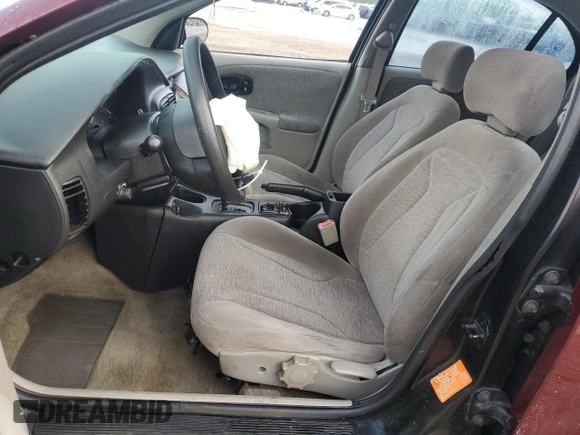 2001 Saturn SL with VIN 1G8ZK527X1Z336965, listed as a Copart auction lot 50091285 with 168,743 mi miles and Salvage title. Bid and sale history available at DreamBid. Image 7.