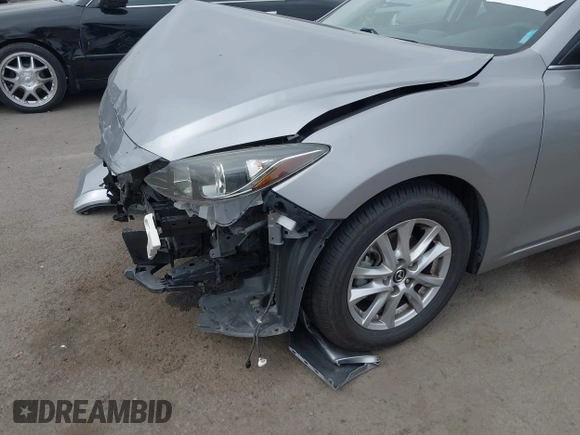 2014 Mazda 3 i Touring with VIN JM1BM1L76E1204265, listed as a IAAI auction lot 42565471 with 68,675 mi miles and . Bid and sale history available at DreamBid. Image 6.