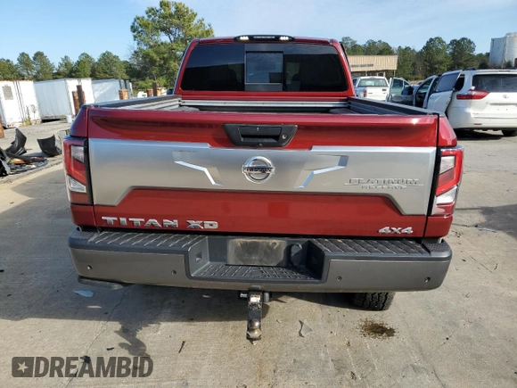 2021 Nissan Titan SV z VIN 1N6AA1FBXMN513634, wystawiony jako Copart lot #41454345 z przebiegiem 110 134 mil mil oraz Szkoda całkowita • Salvage title. Historia ofert i sprzedaży dostępna na DreamBid. Obrazek 6.