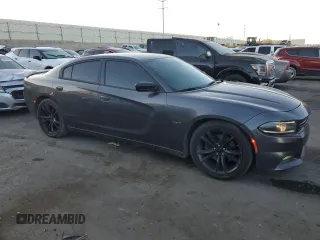 2016 Dodge Charger R/T with VIN 2C3CDXCT1GH283471, listed as a Copart auction lot 75701504 with 127,151 mi miles and Salvage title. Bid and sale history available at DreamBid. Image 4.