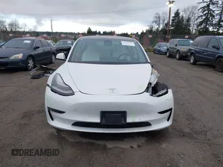 2021 Tesla Model 3 Long Range with VIN 5YJ3E1EB3MF856009, listed as a IAAI auction lot 41809767 with 42,072 mi miles. Bid and sale history available at carsss.com. Image 13.
