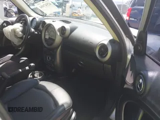2011 MINI Countryman S with VIN WMWZC5C53BWL53641, listed as a IAAI auction lot 42547084 with 171,647 mi miles and . Bid and sale history available at DreamBid. Image 5.