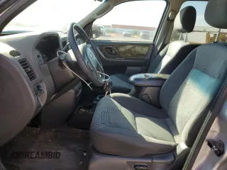 2003 Ford Escape XLT Popular 2 with VIN 1FMYU93123KD17718, listed as a Copart auction lot 74043074 with 347,585 mi miles and Clean Title. Bid and sale history available at carsss.com. Image 7.
