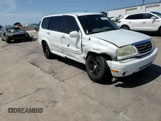 2003 Suzuki XL7 Touring with VIN JS3TY92V334105374, listed as a Copart auction lot 64013375 with 177,939 mi miles and Salvage title. Bid and sale history available at DreamBid. Image 13.