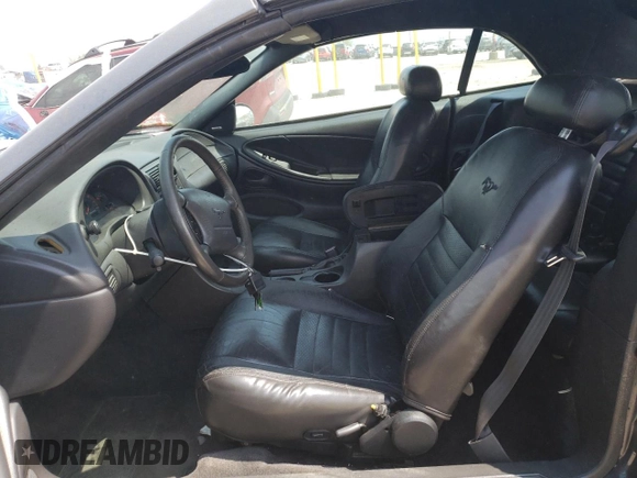 2003 Ford Mustang GT Deluxe with VIN 1FAFP45X43F387520, listed as a Copart auction lot 56302185 with 134,537 mi miles and Salvage title. Bid and sale history available at DreamBid. Image 7.