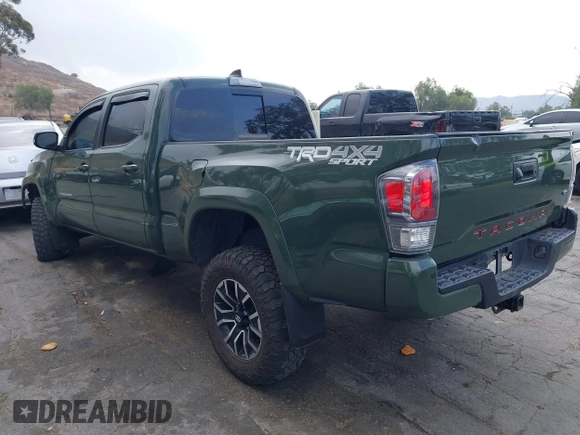2021 Toyota Tacoma 4WD SR5 with VIN 3TMDZ5BN0MM116198, listed as a IAAI auction lot 41445815 with 59,561 mi miles. Bid and sale history available at carsss.com. Image 3.