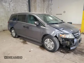 2015 Honda Odyssey with VIN 5FNRL5H20FB030966, listed as a Copart auction lot 55086665 with 123,100 mi miles and Salvage Title. Bid and sale history available at DreamBid. Image 4.