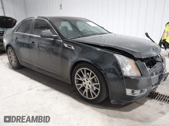 2013 Cadillac CTS Premium z VIN 1G6DS5E34D0103328, wystawiony jako IAAI lot #41501406 z przebiegiem 157 633 mil mil oraz . Historia ofert i sprzedaży dostępna na DreamBid. Obrazek 1.