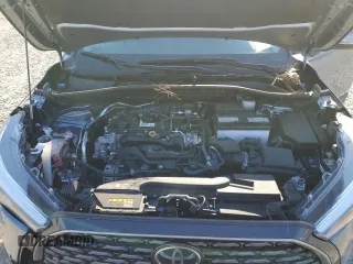 2023 Toyota Corolla Cross XLE z VIN 7MUDAAAG5PV055380, wystawiony jako Copart lot #46280925 z przebiegiem 12 575 mil mil oraz Szkody całkowita. Historia ofert i sprzedaży dostępna na DreamBid. Obrazek 12.