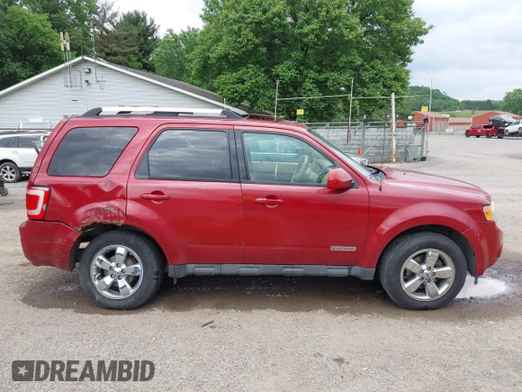 2010 Ford Escape Limited z VIN 1FMCU0EG5AKC21828, wystawiony jako IAAI lot #42343582 z przebiegiem 135 534 mil mil oraz . Historia ofert i sprzedaży dostępna na DreamBid. Obrazek 14.
