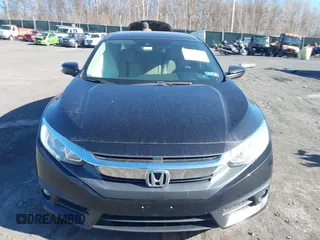2017 Honda Civic EX with VIN 19XFC2F87HE076134, listed as a IAAI auction lot 41863290 with 61,583 mi miles and . Bid and sale history available at DreamBid. Image 12.