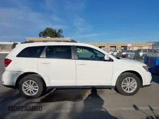 2015 Dodge Journey SXT with VIN 3C4PDCBG8FT673824, listed as a IAAI auction lot 41603661 with 169,939 mi miles and . Bid and sale history available at DreamBid. Image 13.