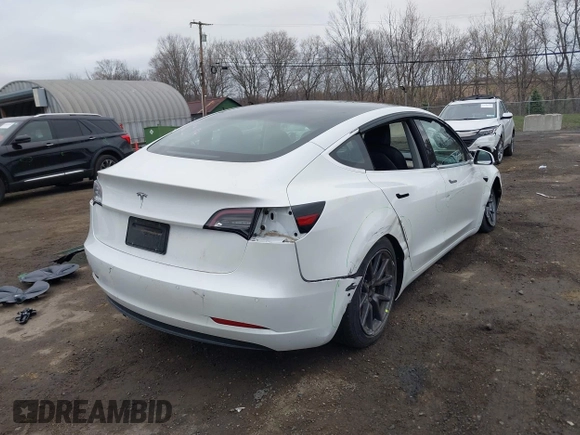 2020 Tesla Model 3 Standard Range Plus with VIN 5YJ3E1EA7LF659172, listed as a IAAI auction lot 42017026 with 32,104 mi miles. Bid and sale history available at carsss.com. Image 6.