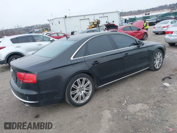 2012 Audi A8 с VIN WAUAVAFD0CN035731, выставлен на аукционе IAAI как лот 41286022 с пробегом 82 835 миль миль и . История ставок и продаж доступна на DreamBid. Изображение 4.