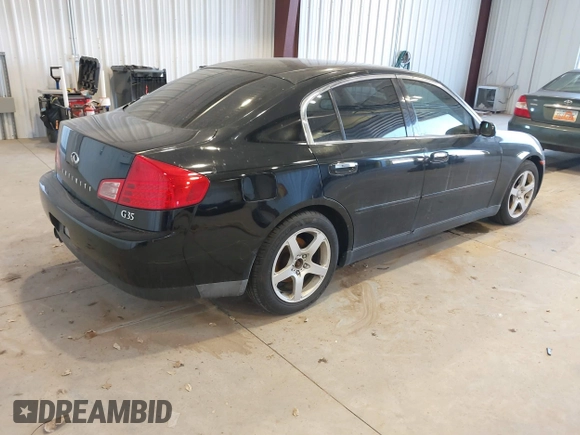 2003 Infiniti G35 w/Leather with VIN JNKCV51E53M304703, listed as a IAAI auction lot 41470321 with 227,894 mi miles. Bid and sale history available at carsss.com. Image 4.